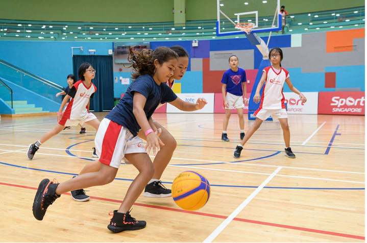 Teenage girls in a basketball session